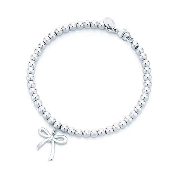 Roostick Bow Charm Bead Bracelet
