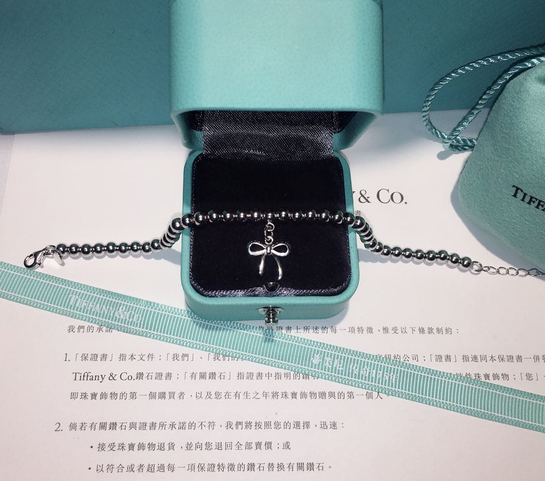 Roostick Bow Charm Bead Bracelet