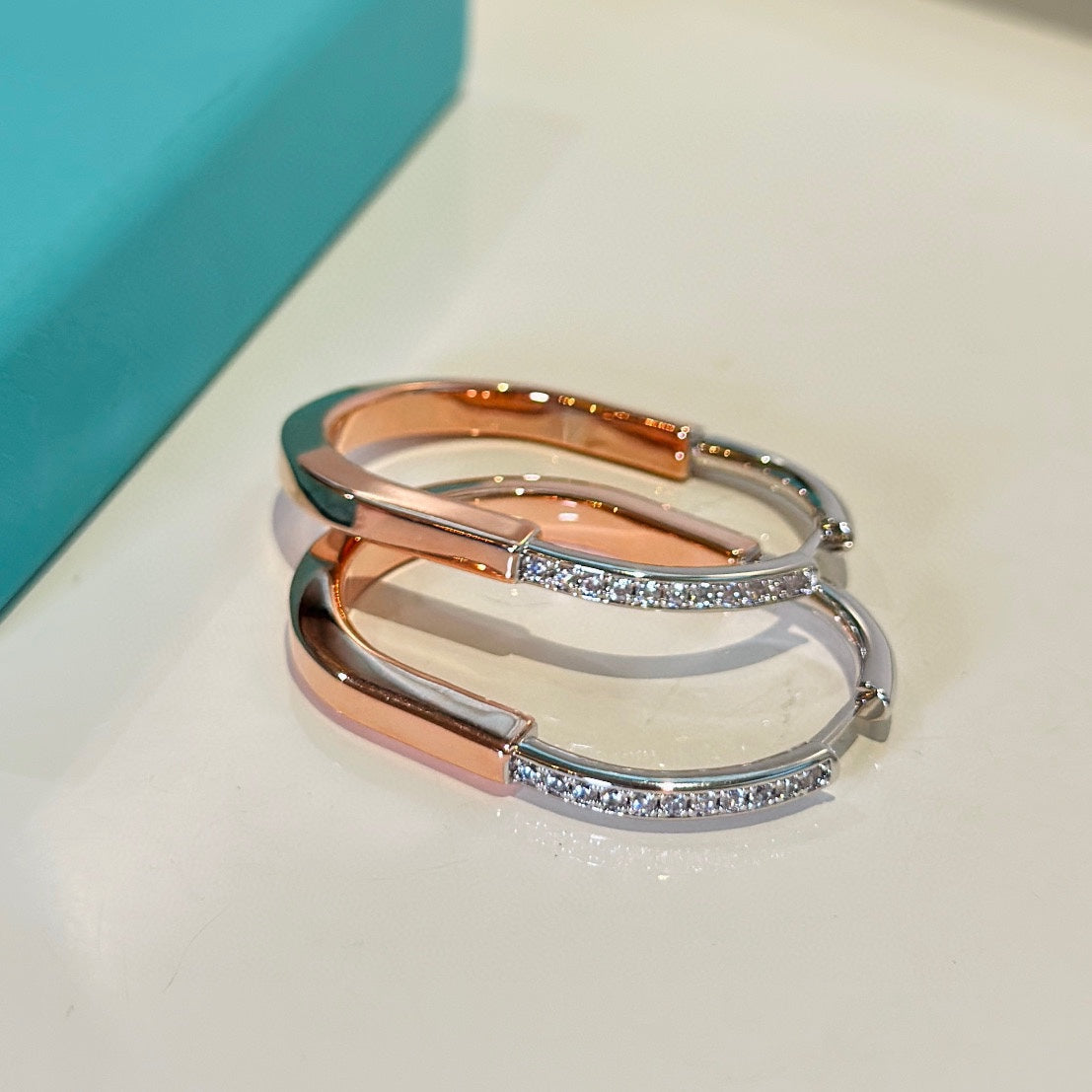 Roostick T Lock Diamond Earrings